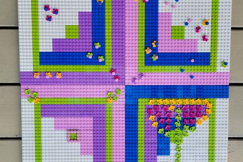 A quilt design using small bricks using different colors